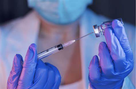 中国应最晚明年年中时达到70%-80%的新冠疫苗接种率